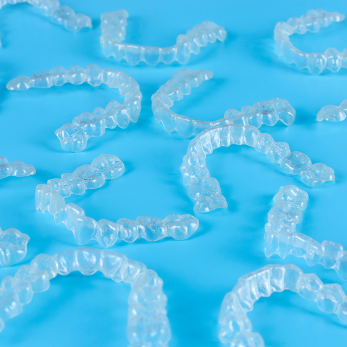 Image of multiple retainers on a blue background